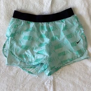 Nike running shorts EXCELLENT shape, built in liner. WOMANS MEDIUM. MINT GREEN